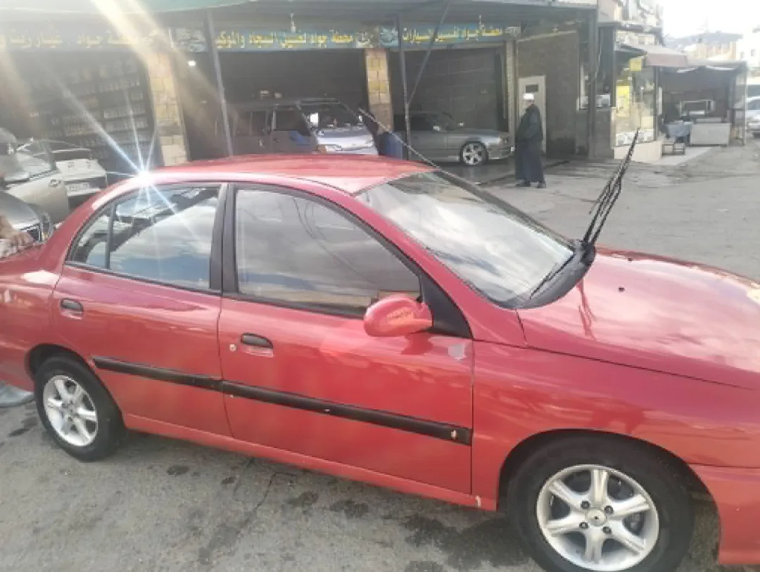سياره كيا ريو 2002خالي قص قلبان قير اوتوماتيك منتهي ترخيصها الها 6شهورسعر البيع