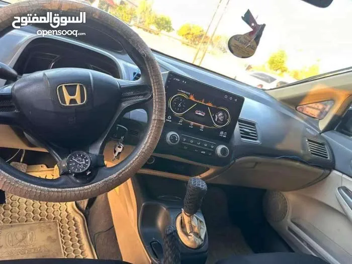 هوندا سيفيك 2006 قير عادي للبيع او البدل على هايبرد بنفس القيمة او لانسر حديثة