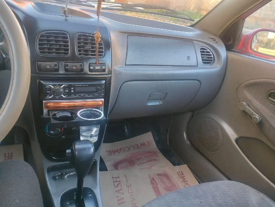 سياره كيا ريو 2002خالي قص قلبان قير اوتوماتيك منتهي ترخيصها الها 6شهورسعر البيع