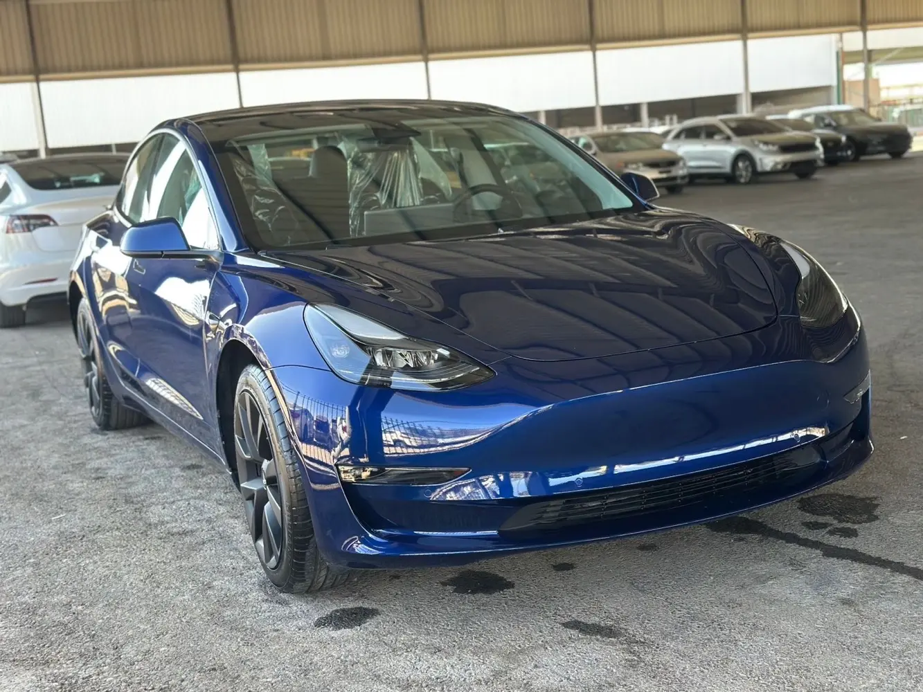 تيسلا مودل 3 موديل 2021 اللون الخارجي ازرق  اللون الداخلي اسود الفحص  4 جيد