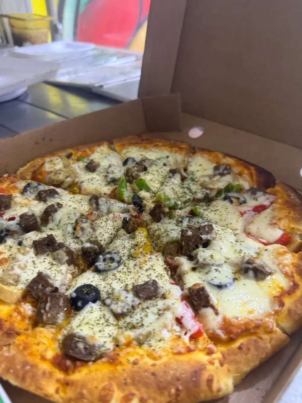 بيتزا ومعجنات الكبير أوي