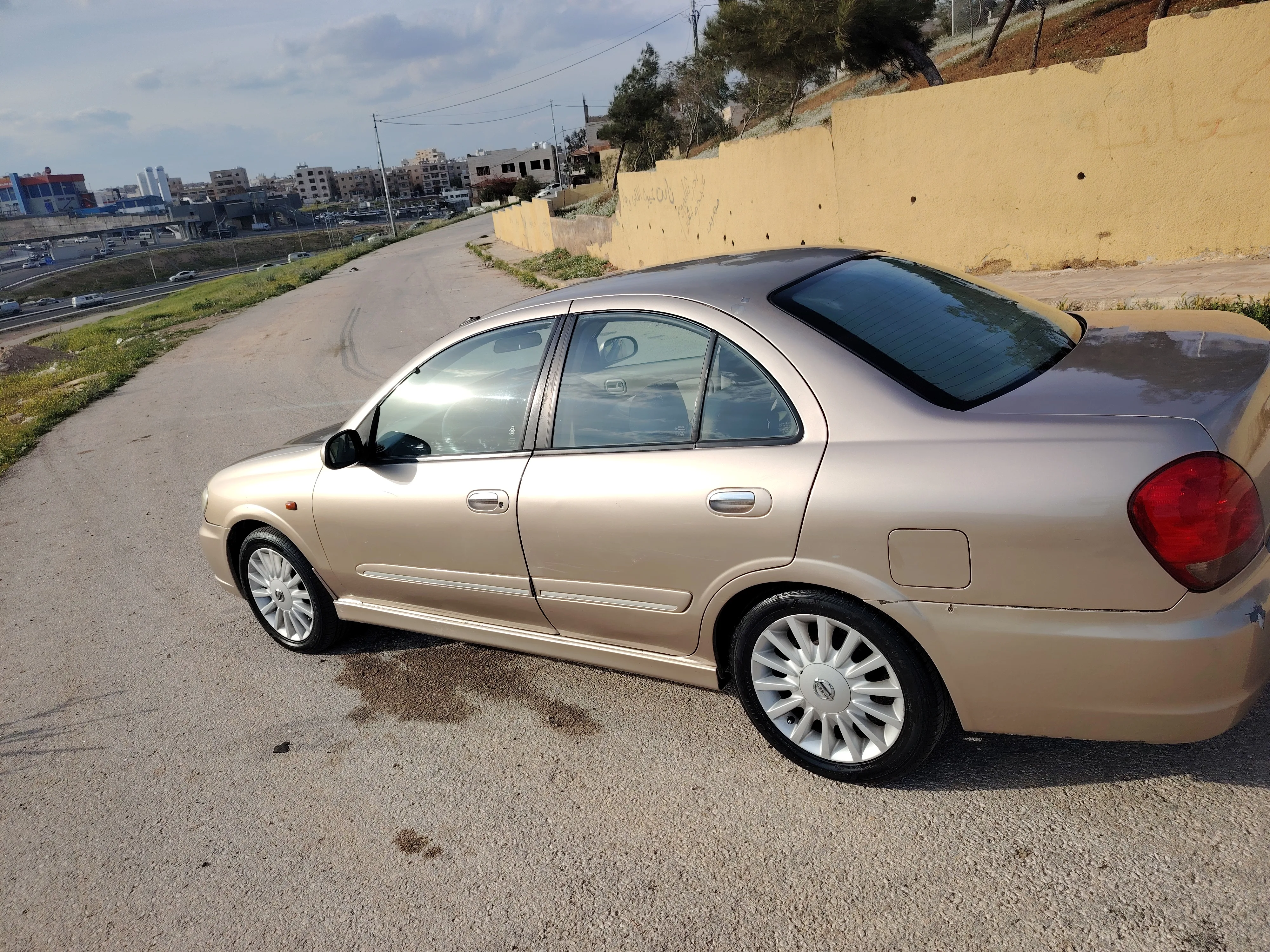 نيسان صني 2004 محوله ٢٠١٢ فحص ٣جيد واحد مضروب