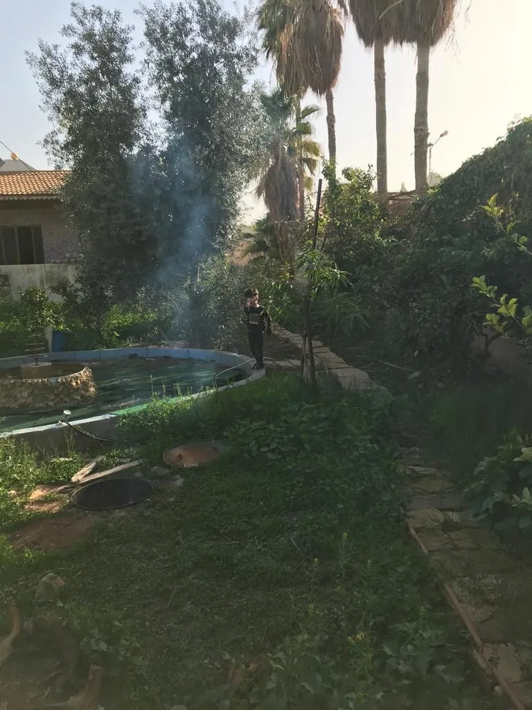 مزرعة مع بيت ريفي في الغور