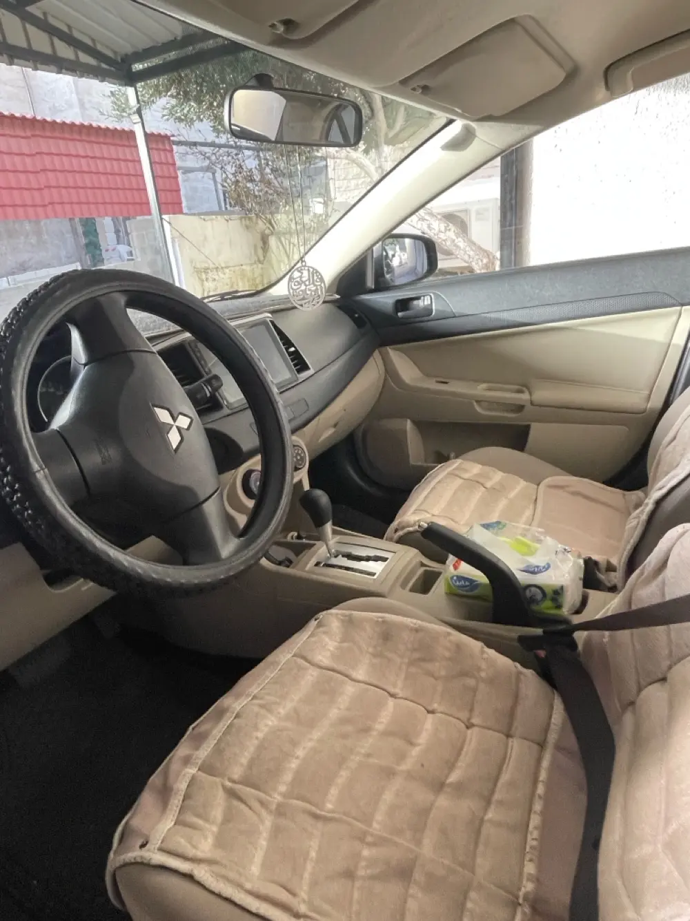 👉 لانسر EX 2015 مخزّنة – ممشى 44 ألف فقط