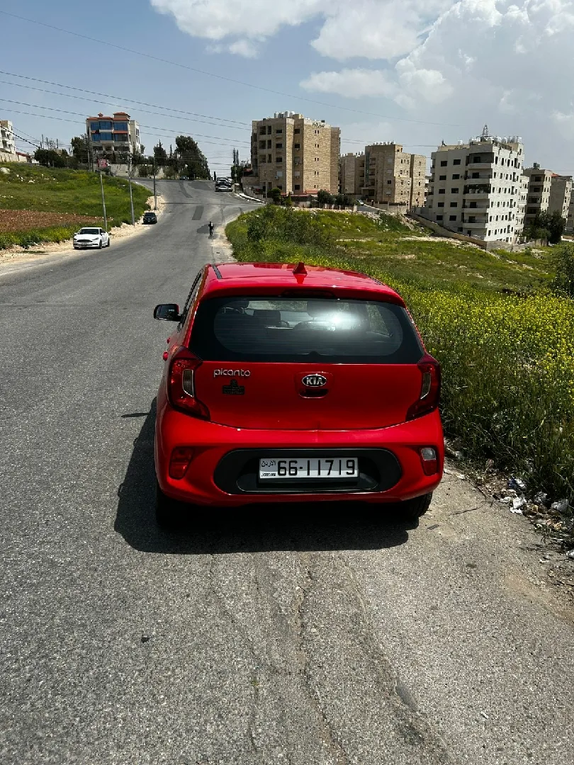 كيا بيكانتو موديل 2021 لون احمر جميل جير اوتوماتيك فحص 3 جيد للبيع