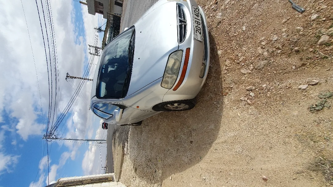 دايو كالوس ( نفس شفر افيو) موديل 2002 جير اتوماتيك ترخيص حتى 2/2027